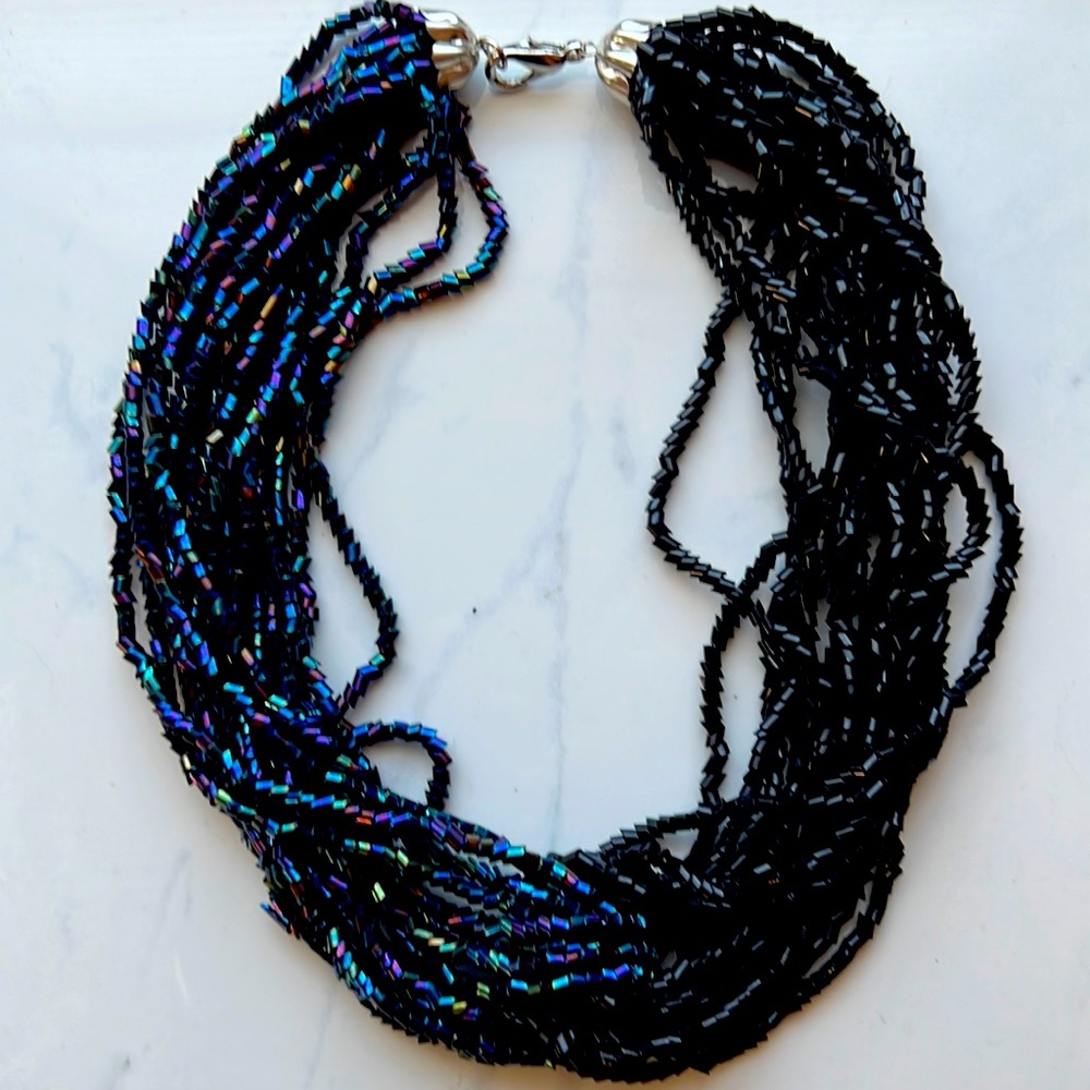 Beautiful beaded necklace one side black one side beautiful metallics